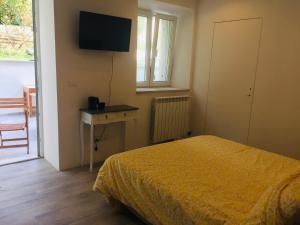 TV a/nebo společenská místnost v ubytování B&B MonteCengio