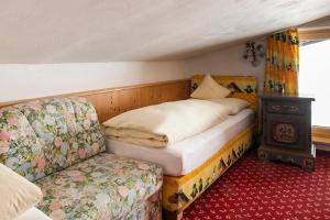 Postel nebo postele na pokoji v ubytování Hotel Anemone