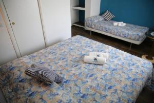 Postel nebo postele na pokoji v ubytování House SottoCoperta