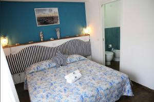 Postel nebo postele na pokoji v ubytování House SottoCoperta