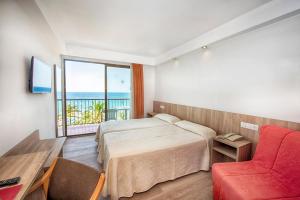 Postel nebo postele na pokoji v ubytování Hotel Montemar + 37 fotografií
