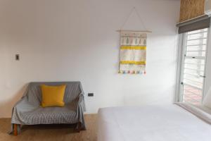Una cama o camas en una habitación de HELLO Make Yourself at Home