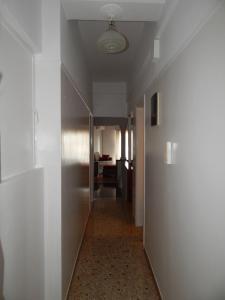 Postel nebo postele na pokoji v ubytování ATHENS RIVIERA SEA VIEW APARTMENT