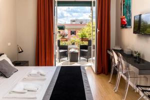 A bed or beds in a room at Top Floor Trastevere