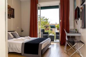 A bed or beds in a room at Top Floor Trastevere