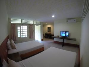 Кровать или кровати в номере OP Bungalow