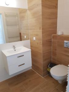 Kúpeľňa v ubytovaní Apartamenty Bursztynowe w Kołobrzegu Sun&Relax