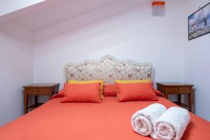Ένα ή περισσότερα κρεβάτια σε δωμάτιο στο Sorrento Luxury Apartment +3 φωτογραφίες