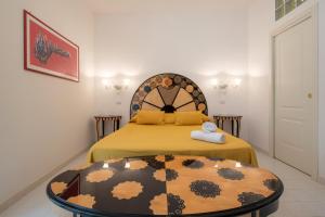 Ένα ή περισσότερα κρεβάτια σε δωμάτιο στο Sorrento Luxury Apartment