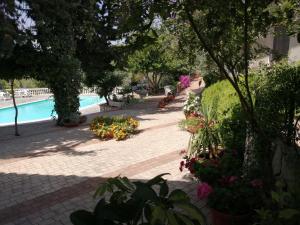 The swimming pool at or close to Agriturismo Vemi Még 37 kép