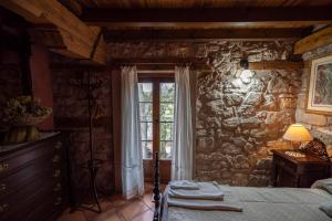 Posteľ alebo postele v izbe v ubytovaní Alojamiento Rural Molino Del Batan