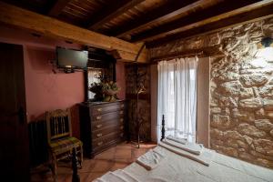 Posteľ alebo postele v izbe v ubytovaní Alojamiento Rural Molino Del Batan
