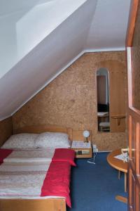 Ein Bett oder Betten in einem Zimmer der Unterkunft Hotel Daria Dworek Myśliwski