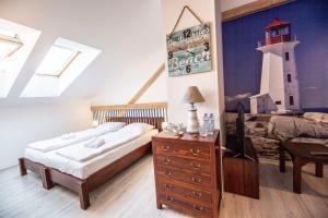 Postel nebo postele na pokoji v ubytování In Spirit, hotel v Rožnovském pivovaru - Pivní Lázně, Wellness & Čokoládovna