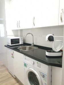 A kitchen or kitchenette at Doña Lola House