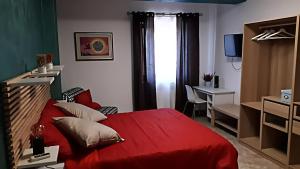 A bed or beds in a room at Notti Rosa B&B
