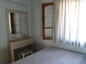 Posteľ alebo postele v izbe v ubytovaní Vourvourou Antonis House