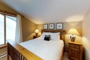 Ένα ή περισσότερα κρεβάτια σε δωμάτιο στο Arolla Chalet D