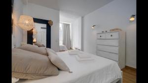 Postel nebo postele na pokoji v ubytování Casa Valentuñana - Marbella Centro + 14 fotografií