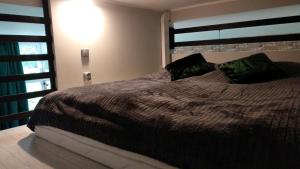 Łóżko lub łóżka w pokoju w obiekcie Apartament 5 przy Parku Leśnym