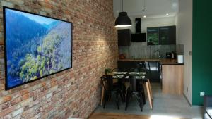 Kuchnia lub aneks kuchenny w obiekcie Apartament 5 przy Parku Leśnym