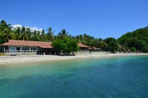 a house on the shore of a beach at Cocotinos Sekotong Lombok in Sekotong