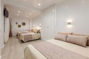 Ein Bett oder Betten in einem Zimmer der Unterkunft Great Apartment Granada City Centre
