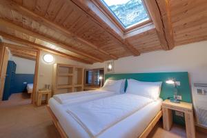 Postel nebo postele na pokoji v ubytování Limarò B&B