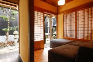 Posezení v ubytování Yamasaki Ryokan Q Nakamonzenya + 12 fotografií