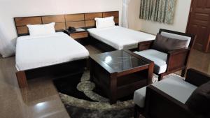 Postel nebo postele na pokoji v ubytování Sky Hotel Nairobi