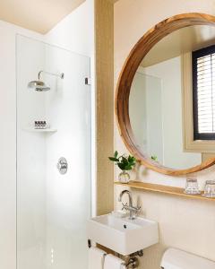 a bathroom with a sink and a mirror at Palihotel San Francisco in San Francisco