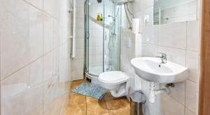 Kúpeľňa v ubytovaní Sereno Apartments