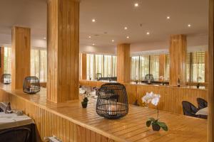 A restaurant or other place to eat at Hotel Villa Magus