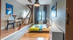 Posteľ alebo postele v izbe v ubytovaní Fenna Apartments 7 minut od Rynku