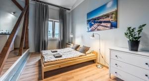 Posteľ alebo postele v izbe v ubytovaní Fenna Apartments 7 minut od Rynku