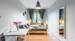 Posteľ alebo postele v izbe v ubytovaní Fenna Apartments 7 minut od Rynku