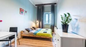 Posteľ alebo postele v izbe v ubytovaní Fenna Apartments 7 minut od Rynku