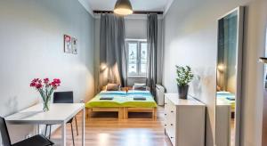 Posteľ alebo postele v izbe v ubytovaní Fenna Apartments 7 minut od Rynku