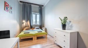 Posteľ alebo postele v izbe v ubytovaní Fenna Apartments 7 minut od Rynku