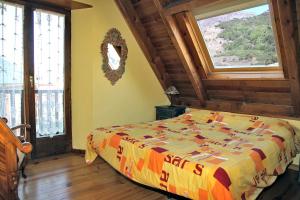 Llit o llits en una habitació de Salardu magnifica casa
