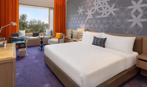 Postel nebo postele na pokoji v ubytování Welcomhotel by ITC Hotels, Raja Sansi, Amritsar