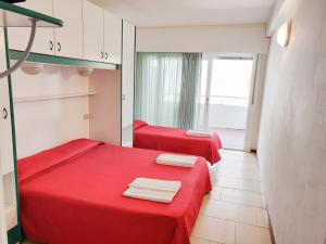 Postel nebo postele na pokoji v ubytování Hotel Ambra