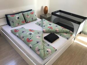 
Posteľ alebo postele v izbe v ubytovaní Apartmán Zajko
