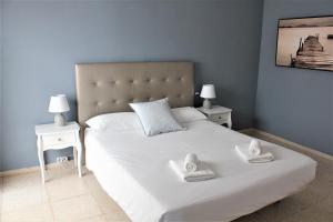 Posteľ alebo postele v izbe v ubytovaní Apartamento con vistas, playa y WIFI + 37 fotografií