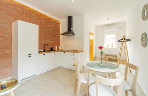 Kuchyňa alebo kuchynka v ubytovaní Apart-Invest Apartament Glamoure