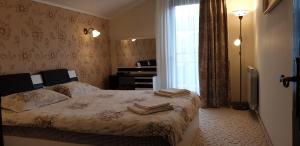 Ein Bett oder Betten in einem Zimmer der Unterkunft Comfort and Views