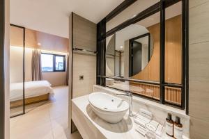 Koupelna v ubytování Brown-Dot Hotel Ulsan-Sincheon + 37 fotografií