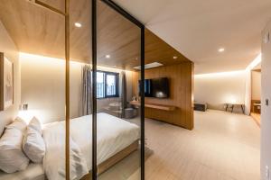 Postel nebo postele na pokoji v ubytování Brown-Dot Hotel Ulsan-Sincheon