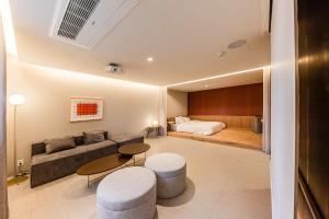Postel nebo postele na pokoji v ubytování Brown-Dot Hotel Ulsan-Sincheon