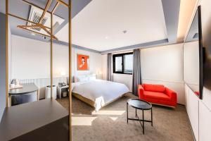 Postel nebo postele na pokoji v ubytování Brown-Dot Hotel Ulsan-Sincheon